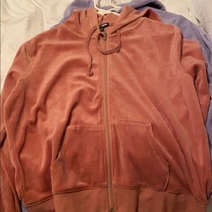 Two velvet zip ups